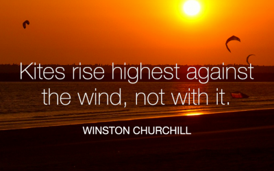 Kites rise highest against the wind, not with it